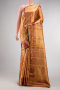 Gold Dual Tone Kanjivaram Tissue Silk Saree with Zari Brocade on the body and Zari Border.  displayed on a mannequin