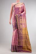 Lavender Dual Tone Kanjivaram Tissue Silk Saree with Zari Brocade on the body and Zari Border.  displayed on a mannequin