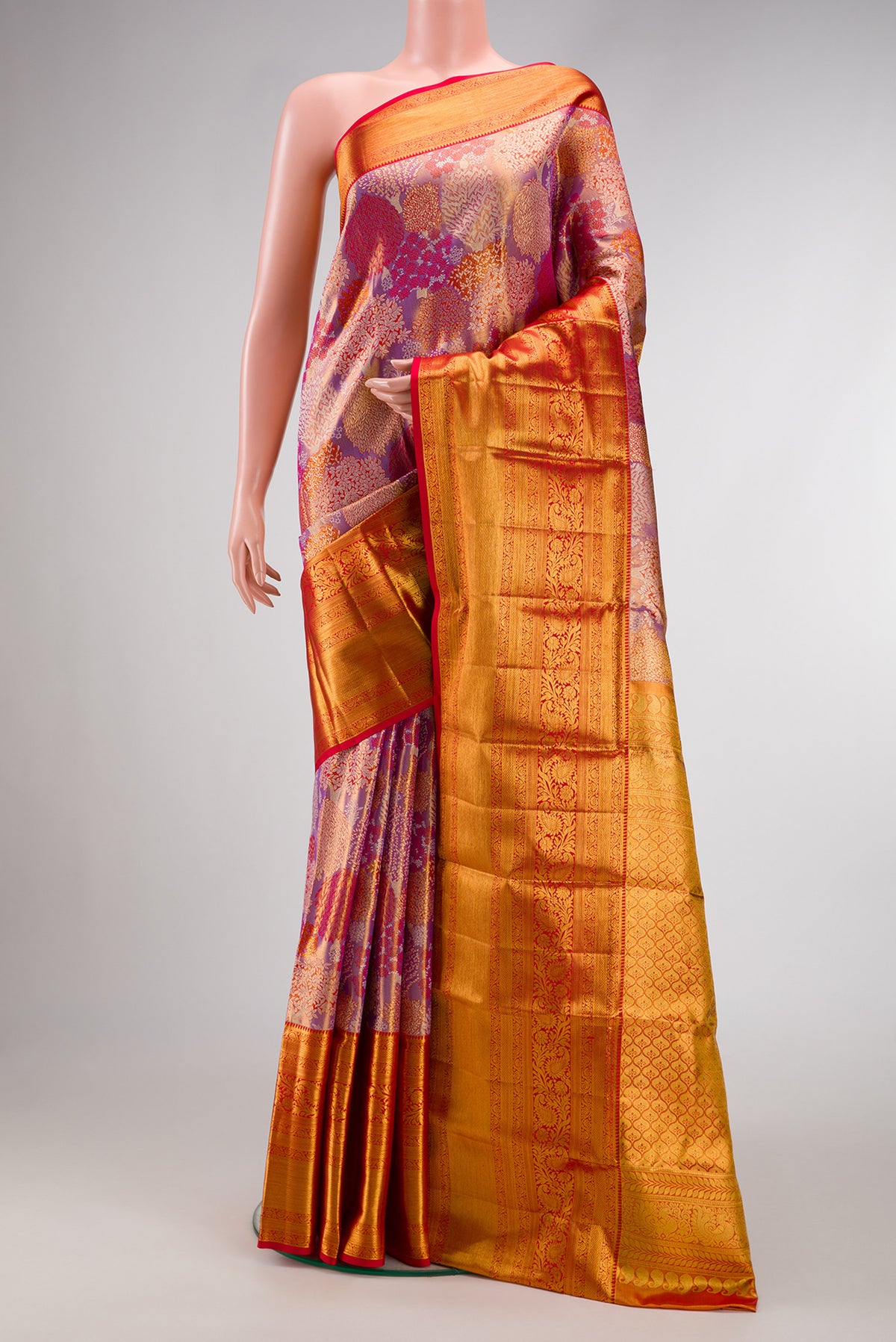 Purple Dual Tone Kanjivaram Tissue Silk Saree with Zari Brocade on the body and Zari Border.  displayed on a mannequin
