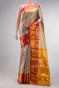 Sky Blue Dual Tone Kanjivaram Tissue Silk Saree with Zari Brocade on the body and Zari Border.  displayed on a mannequin