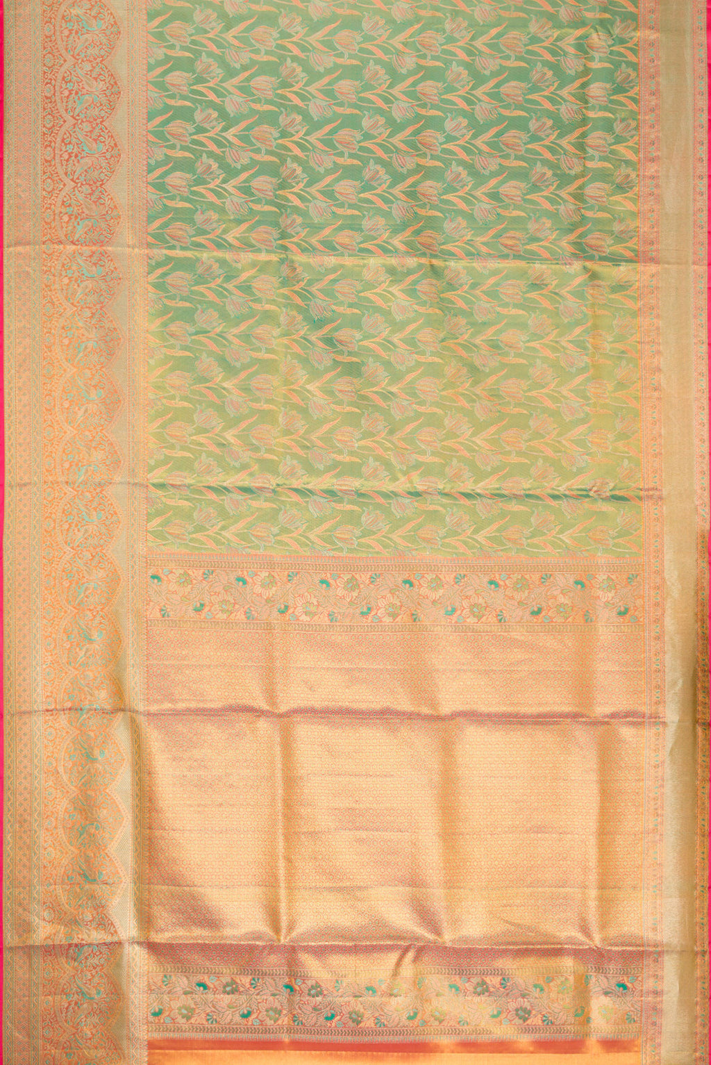 Flat view of Green Kanjivaram Tissue Silk Saree with Zari Brocade on the body and Fancy Border. 