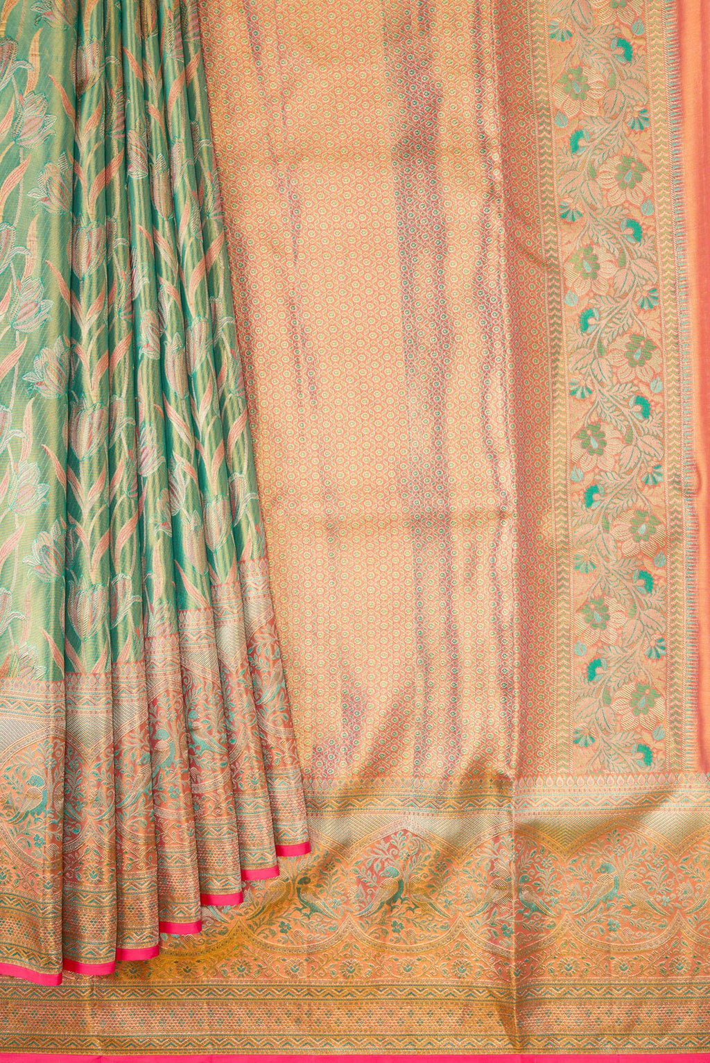 Pleats and pallu of Green Kanjivaram Tissue Silk Saree with Zari Brocade on the body and Fancy Border. 