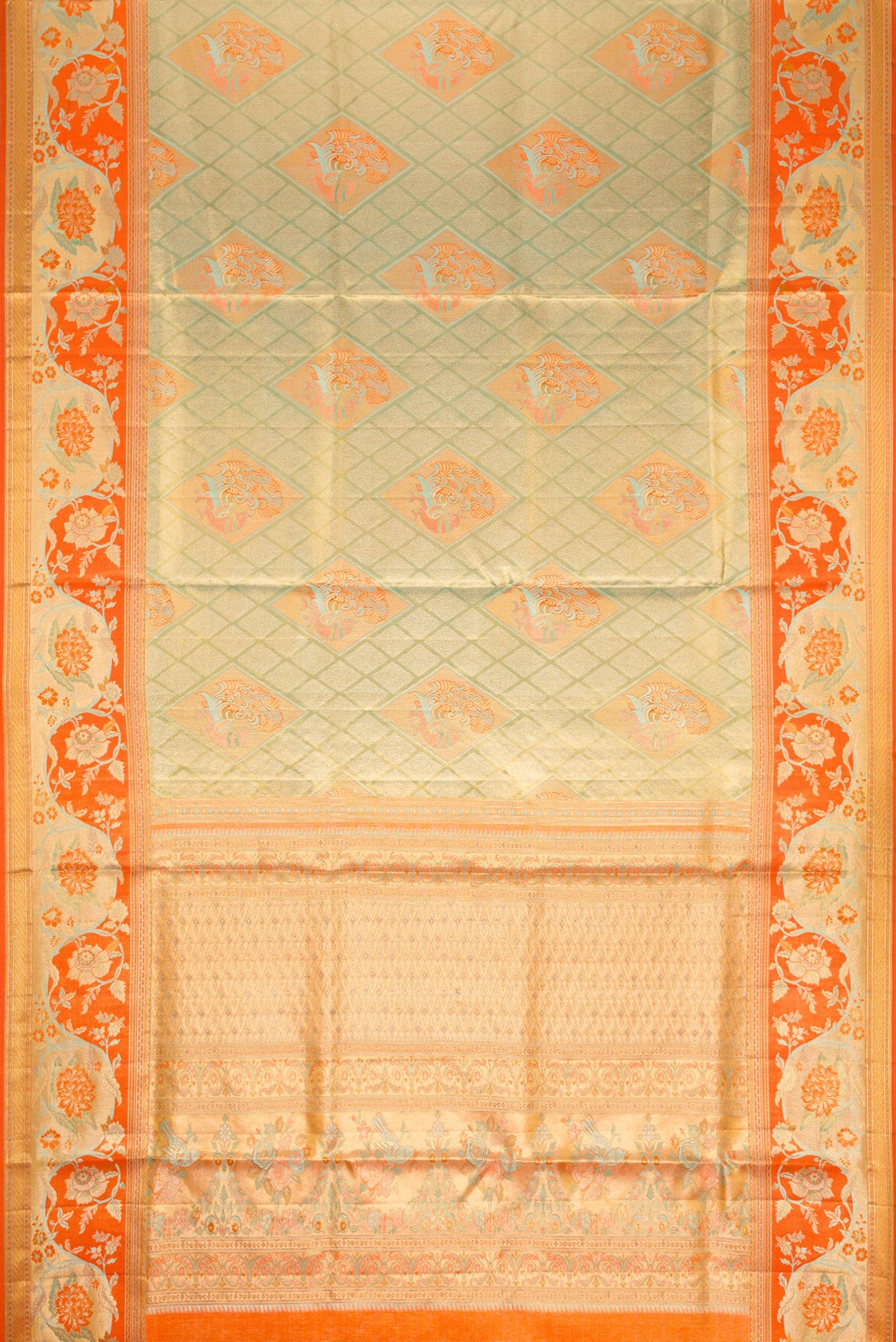 Flat view of Light Green Dual Tone Kanjivaram Tissue Silk Saree with Zari Brocade on the body and Zari Border. 