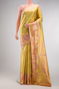 Yellow Kanjivaram Tissue Silk Saree with Zari Brocade on the body and Fancy Border.  displayed on a mannequin