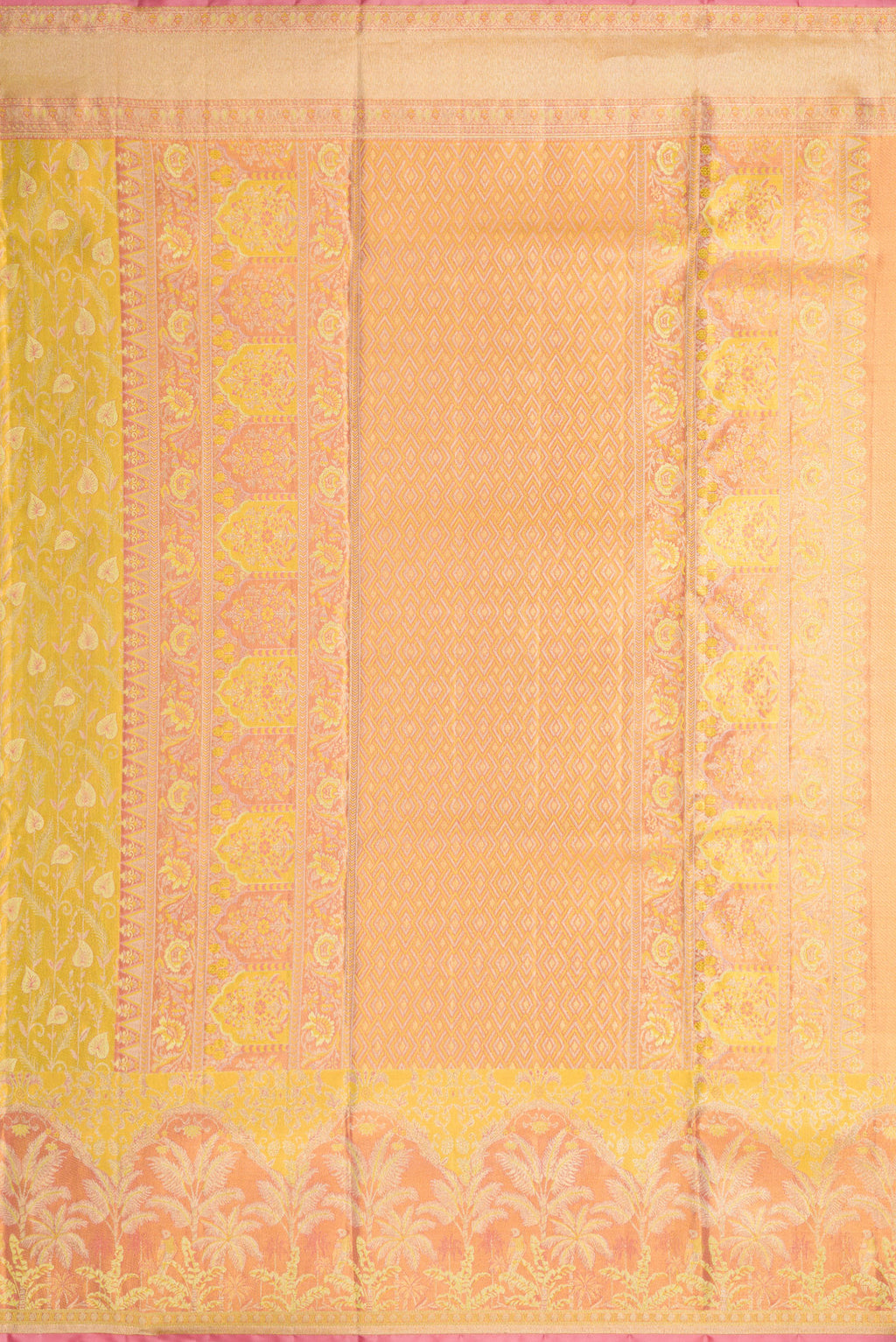 Close up image of the pallu of Yellow Kanjivaram Tissue Silk Saree with Zari Brocade on the body and Fancy Border. 