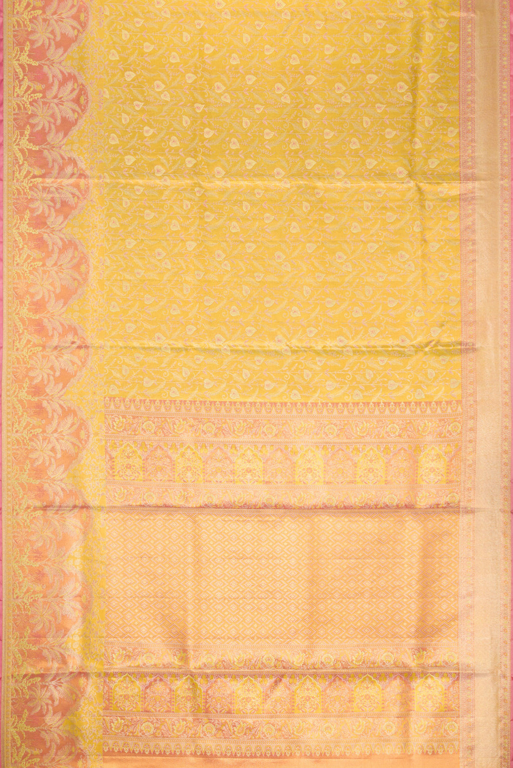 Flat view of Yellow Kanjivaram Tissue Silk Saree with Zari Brocade on the body and Fancy Border. 