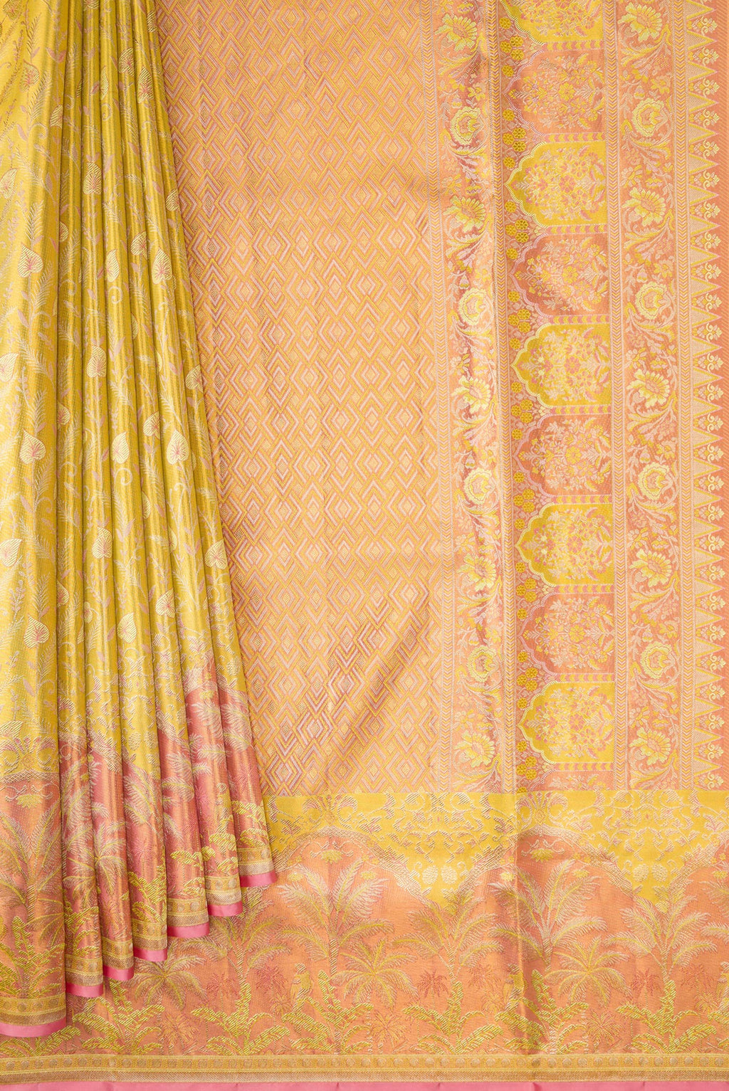Pleats and pallu of Yellow Kanjivaram Tissue Silk Saree with Zari Brocade on the body and Fancy Border. 