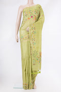 Pista Green Tussar Silk Saree with Plain Body and Embroidery Border.  displayed on a mannequin