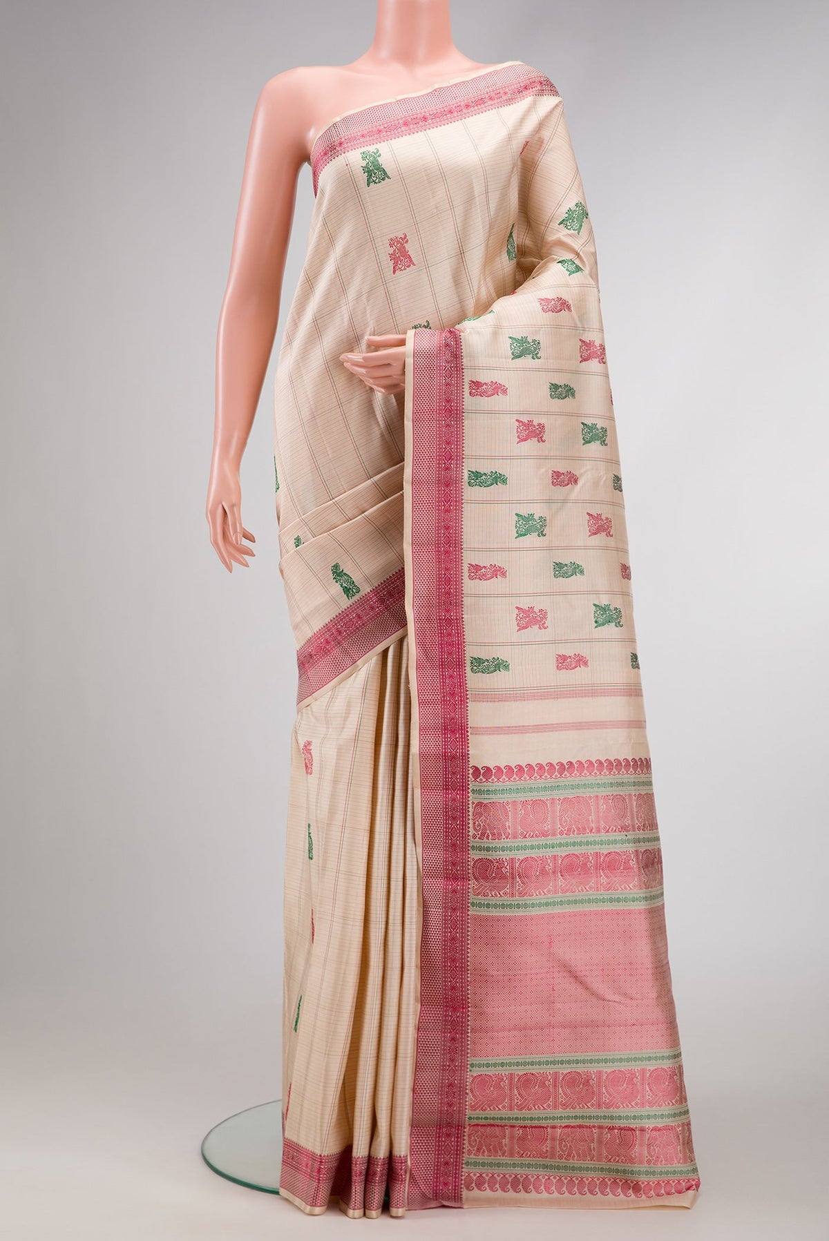 Beige Dual Tone Kanchipuram Silk Saree with Stripes on the body and Fancy Border.  displayed on a mannequin