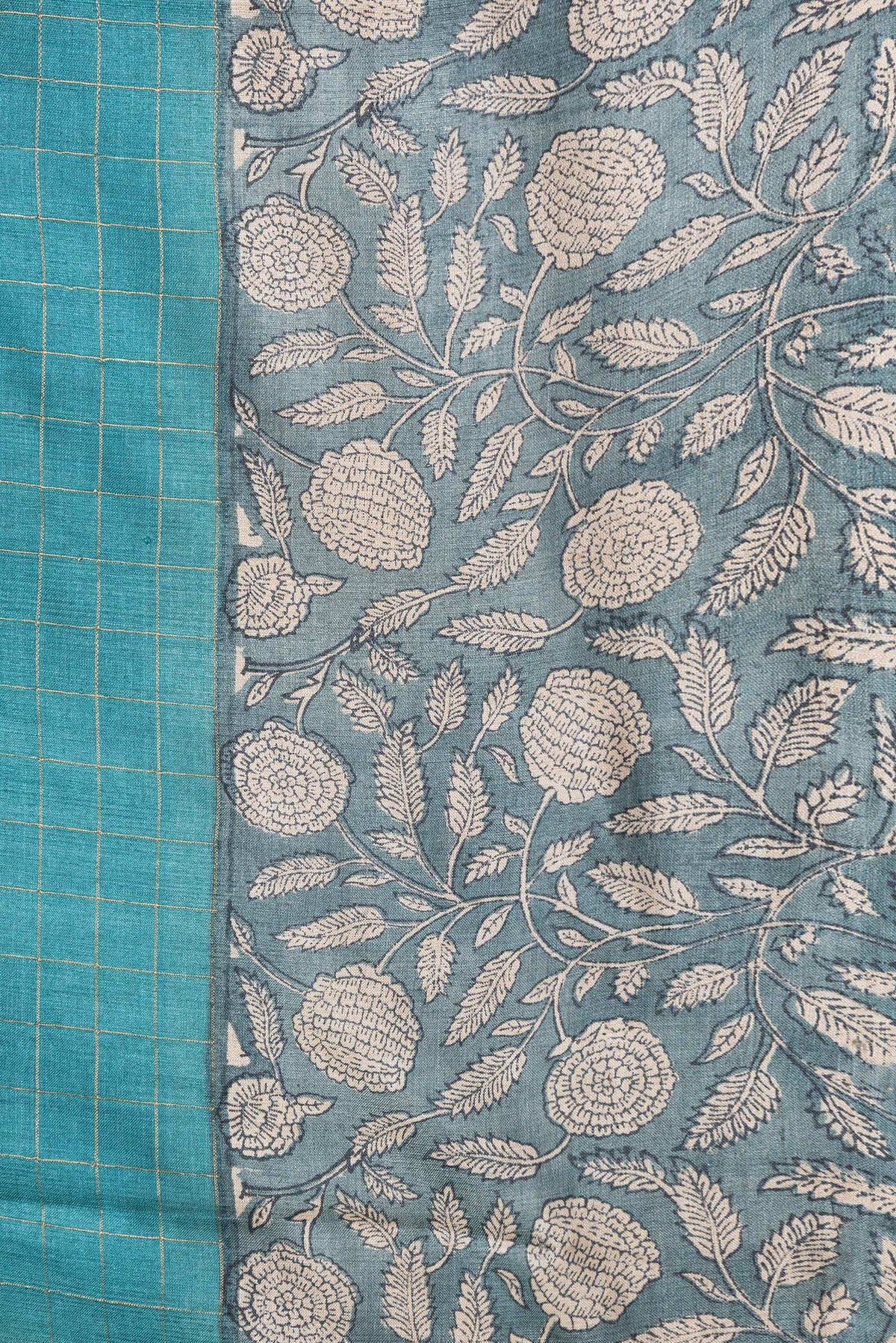 Border image of Sky Blue Dual Tone Tussar Silk Saree with Checked design on the body and Printed Border. 