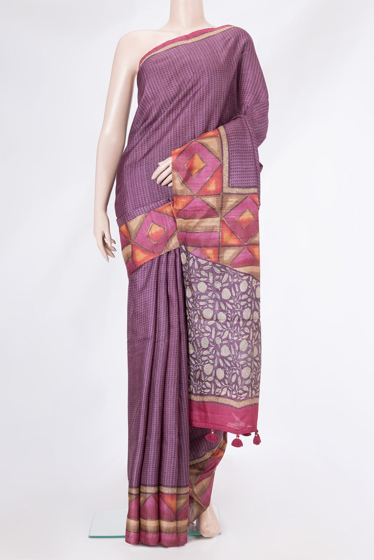 Purple Tussar Silk Saree with Printed design on the body and Fancy Border.  displayed on a mannequin