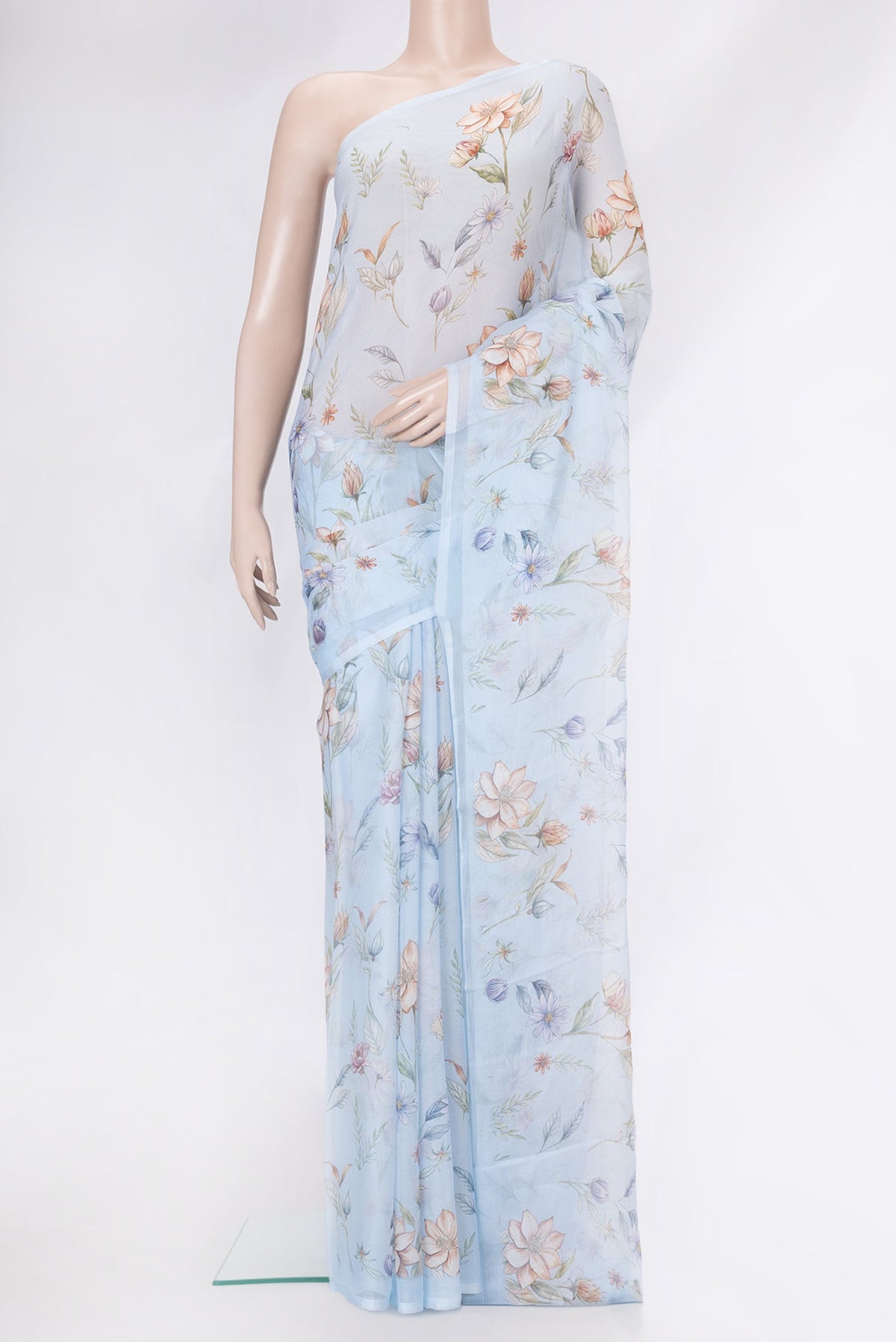 Sky Blue Dual Tone Mysore Chiffon Saree with Printed design on the body and Without Border.  displayed on a mannequin
