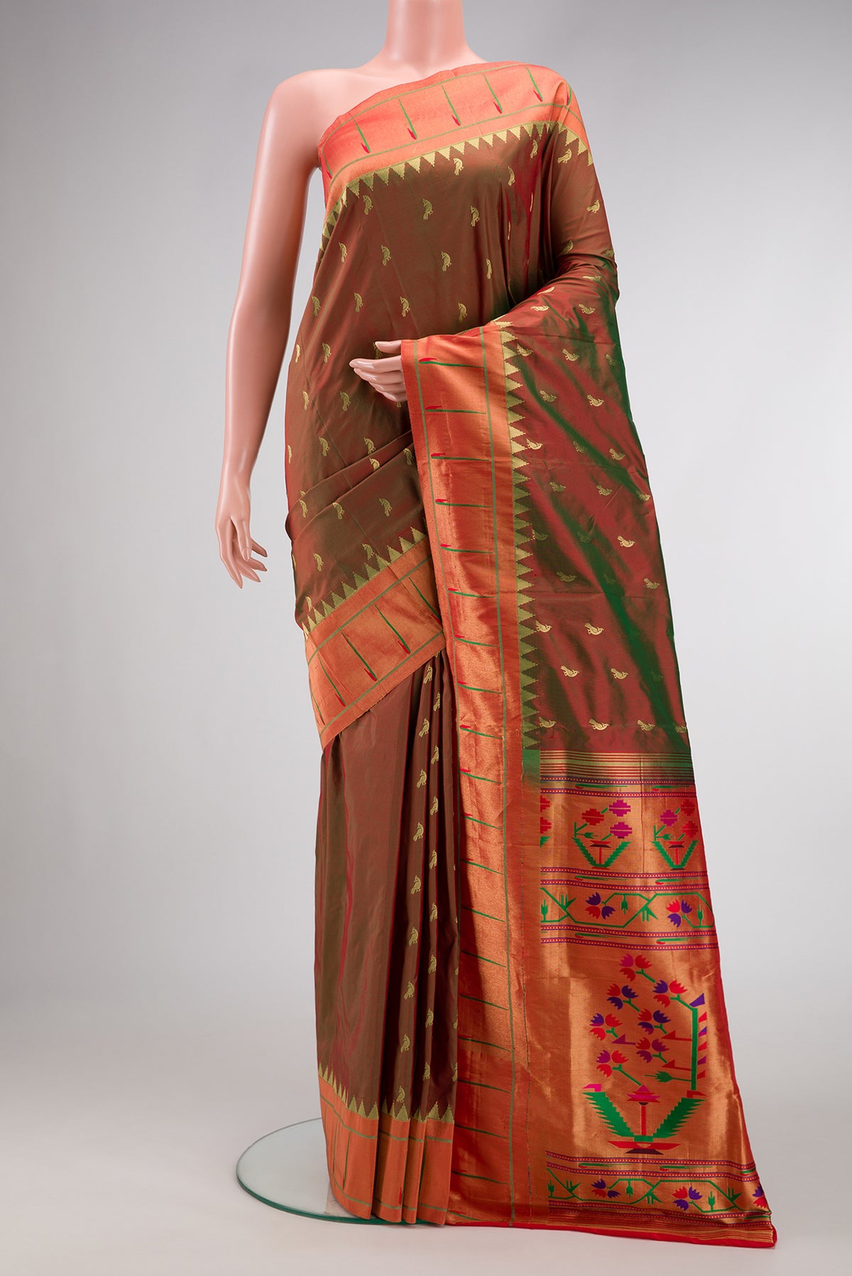 Green with Red Color Paithani Silk Saree with Zari Butta on the body and Paithani Border.  displayed on a mannequin