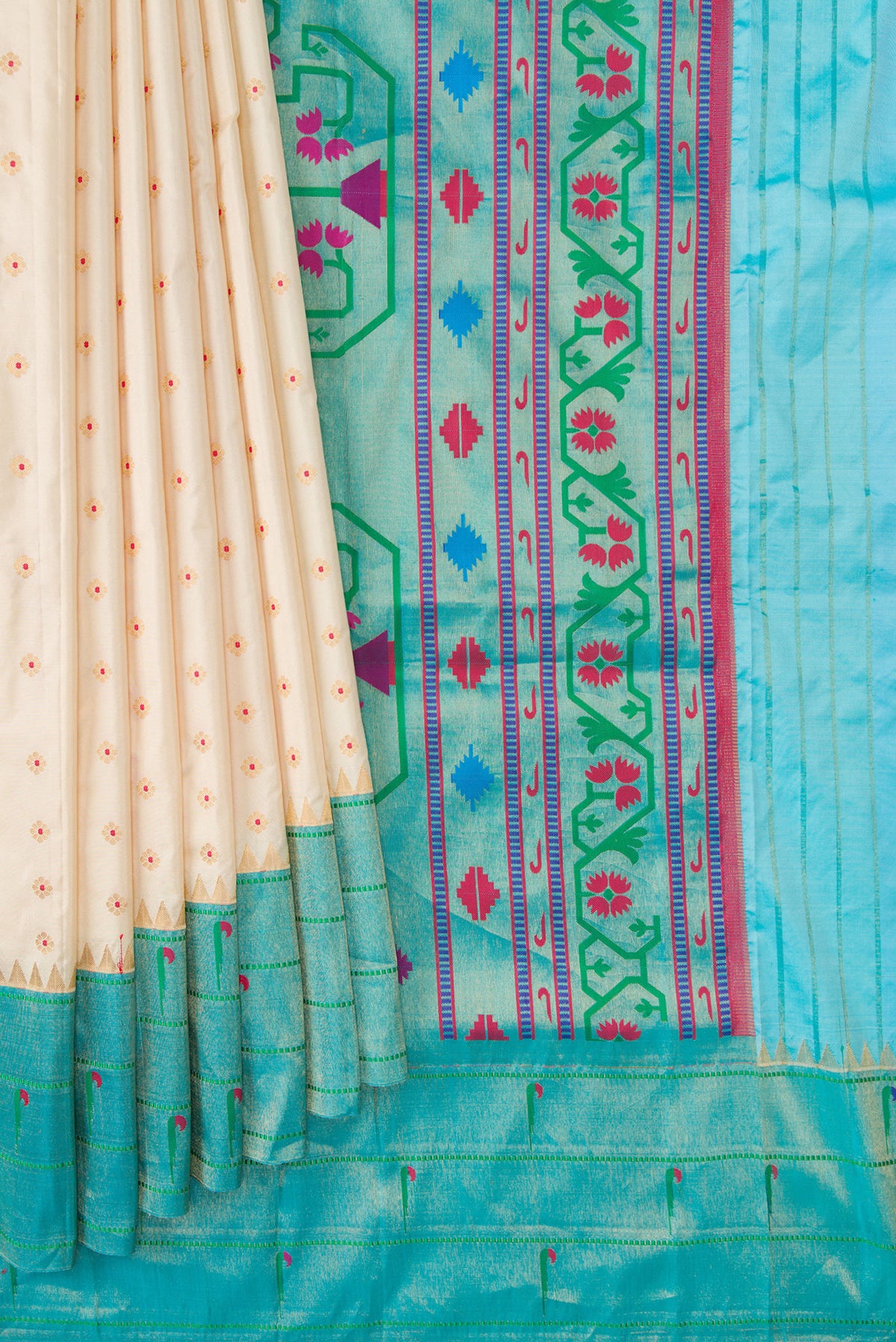 Pleats and pallu of Cream Paithani Silk Saree with Zari Butta on the body and Paithani Border. 