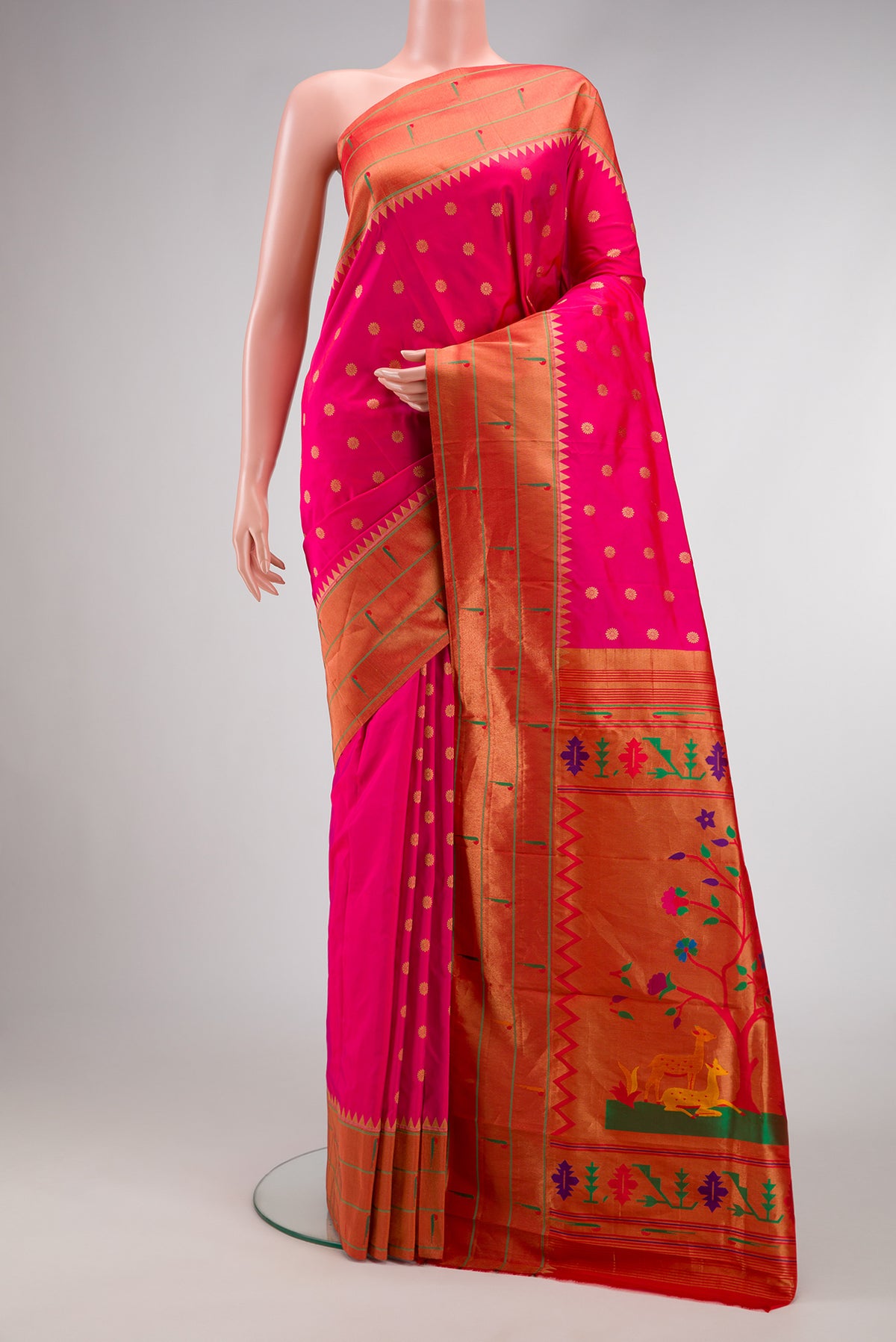 Pink Paithani Silk Saree with Zari Butta on the body and Paithani Border.  displayed on a mannequin
