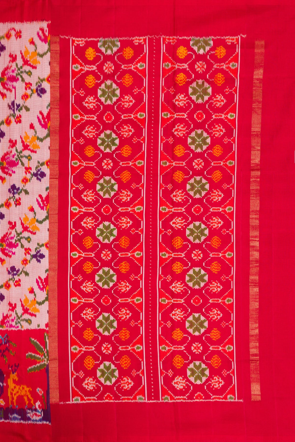 Close up image of the pallu of Rose pink Double Ikat Saree with Pure Ikat on the body and Ikat Border. 