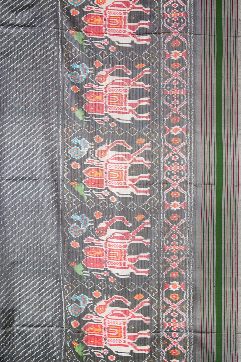 Border image of Grey Dual Tone Double Ikat Saree with Ikat Print on the body and Ikat Border. 