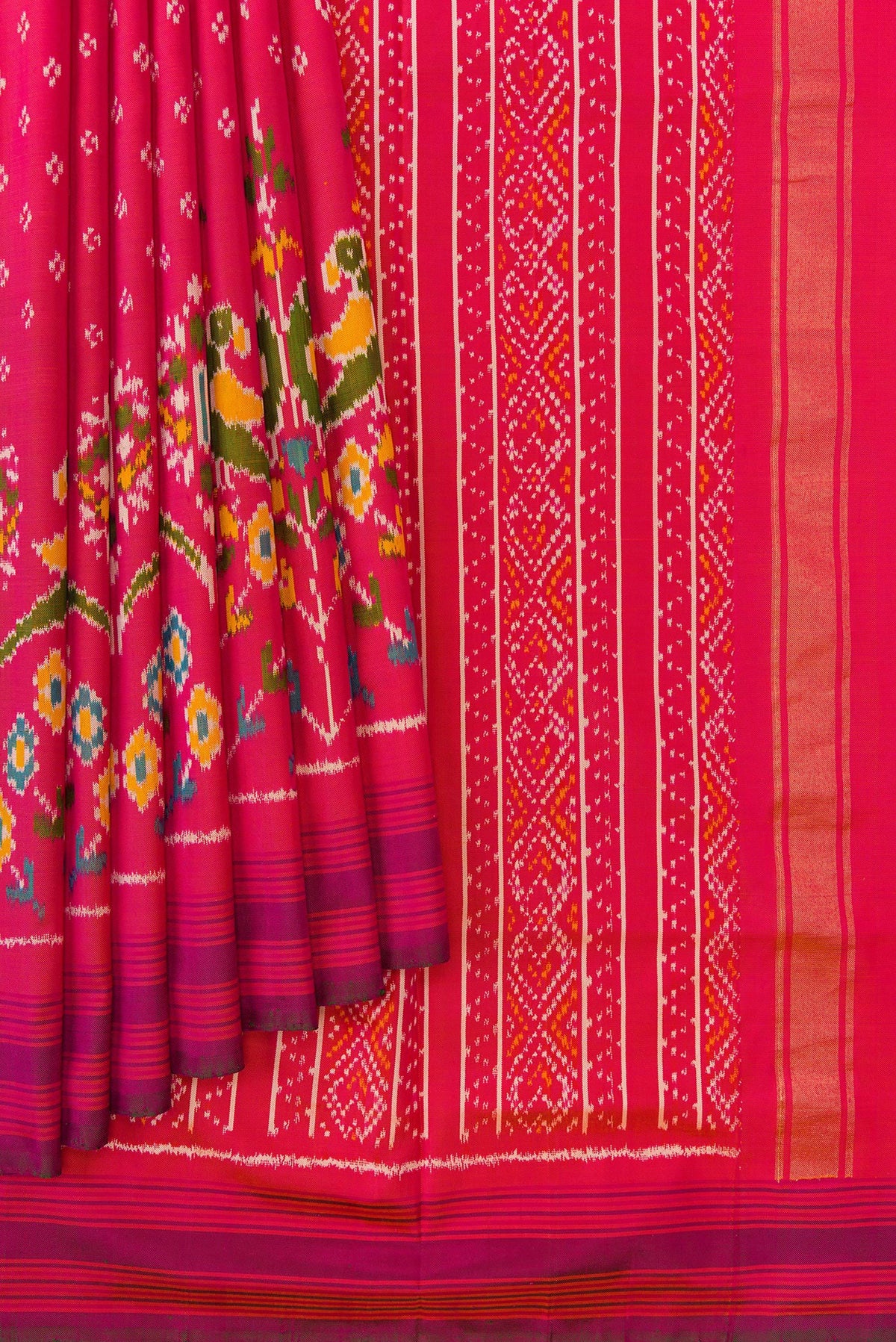 Pleats and pallu of Pink Dual Tone Double Ikat Saree with Ikat Print on the body and Ikat Border. 
