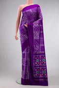Violet Dual Tone Double Ikat Saree with Ikat Print on the body and Plain Border.  displayed on a mannequin
