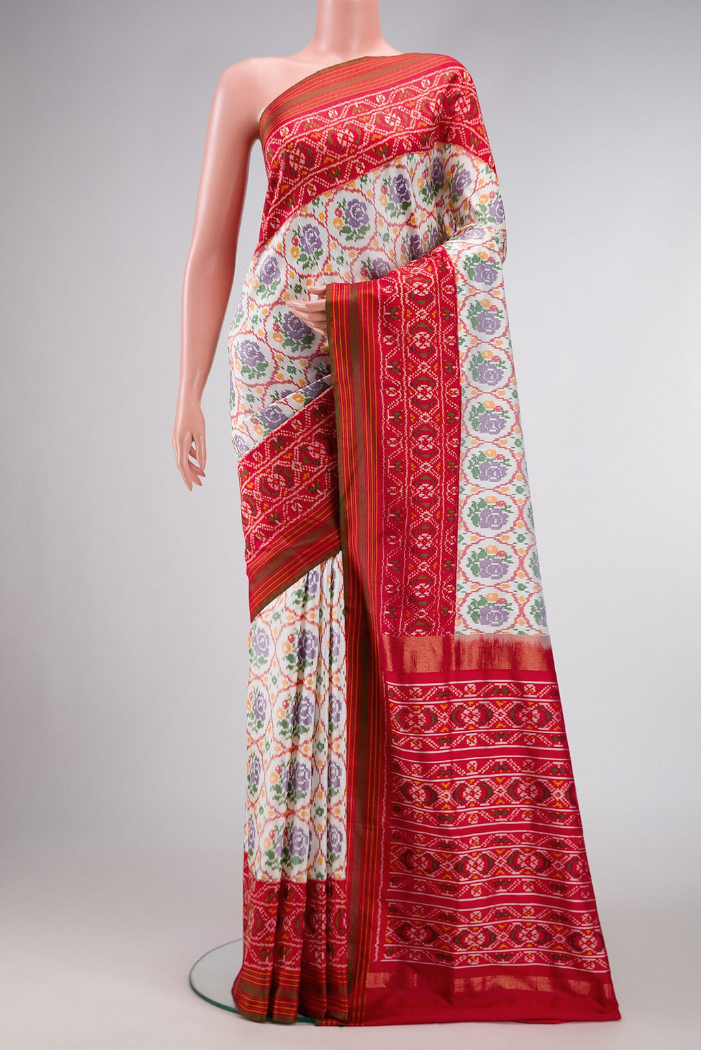 Off White Dual Tone Double Ikat Saree with Ikat Print on the body and Ikat Border.  displayed on a mannequin