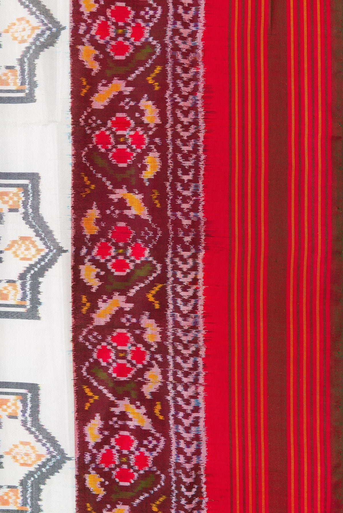 Border image of Off White Dual Tone Double Ikat Saree with Ikat Print on the body and Ikat Border. 