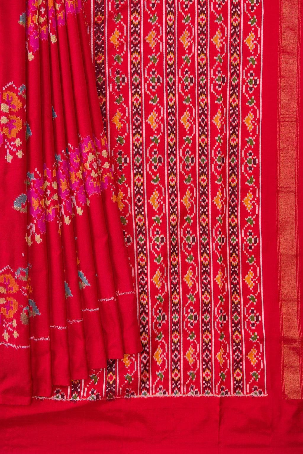 Pleats and pallu of Red Dual Tone Double Ikat Saree with Ikat Print on the body and Zari Border. 