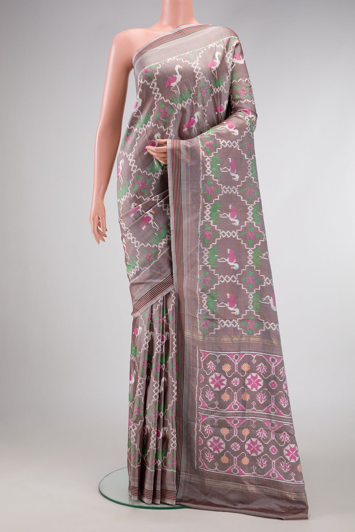 Grey Dual Tone Double Ikat Saree with Ikat Print on the body and Thread Border.  displayed on a mannequin