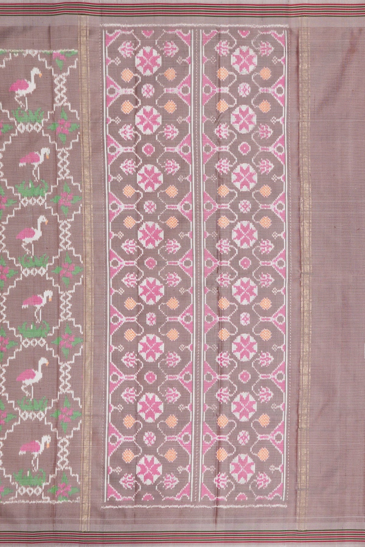 Close up image of the pallu of Grey Dual Tone Double Ikat Saree with Ikat Print on the body and Thread Border. 