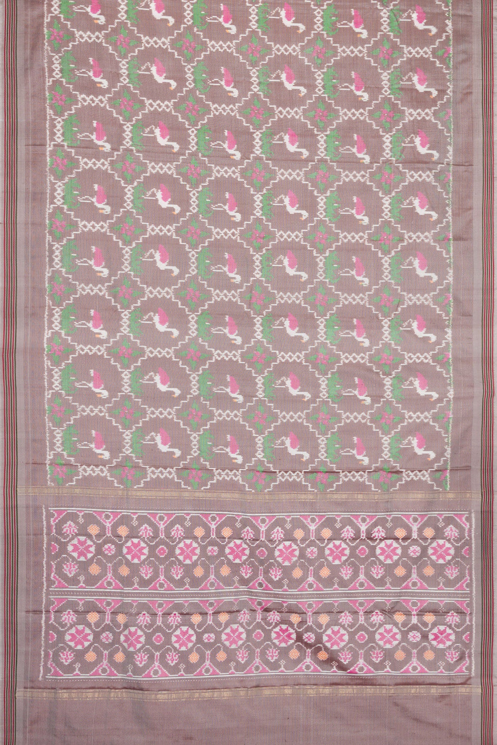 Flat view of Grey Dual Tone Double Ikat Saree with Ikat Print on the body and Thread Border. 