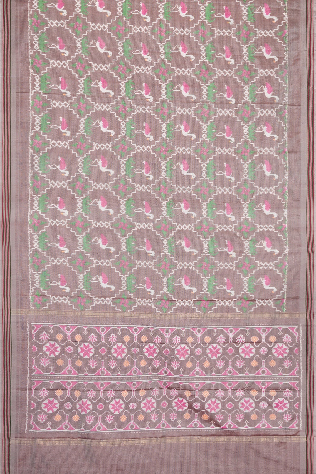 Flat view of Grey Dual Tone Double Ikat Saree with Ikat Print on the body and Thread Border. 