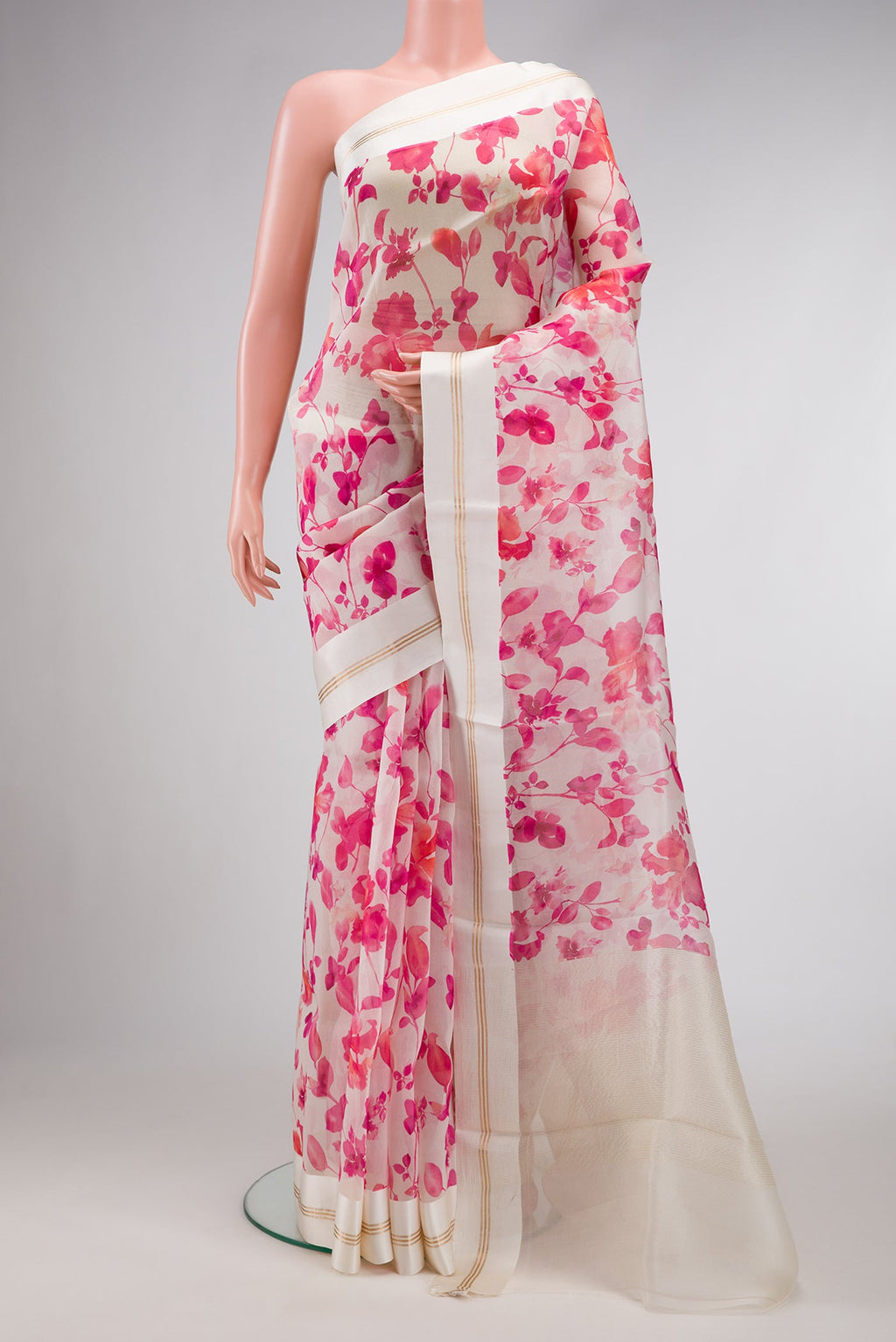 Beige Dual Tone Organza Silk Saree with Printed design on the body and Zari And Thread Border.  displayed on a mannequin