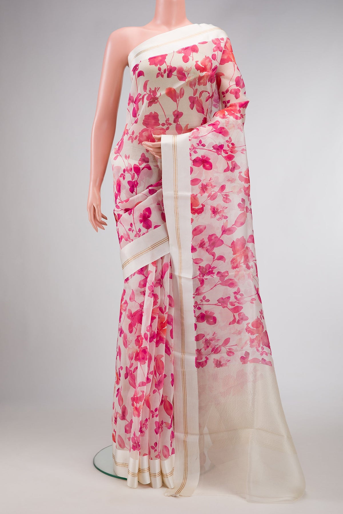 Beige Dual Tone Organza Silk Saree with Printed design on the body and Zari And Thread Border.  displayed on a mannequin