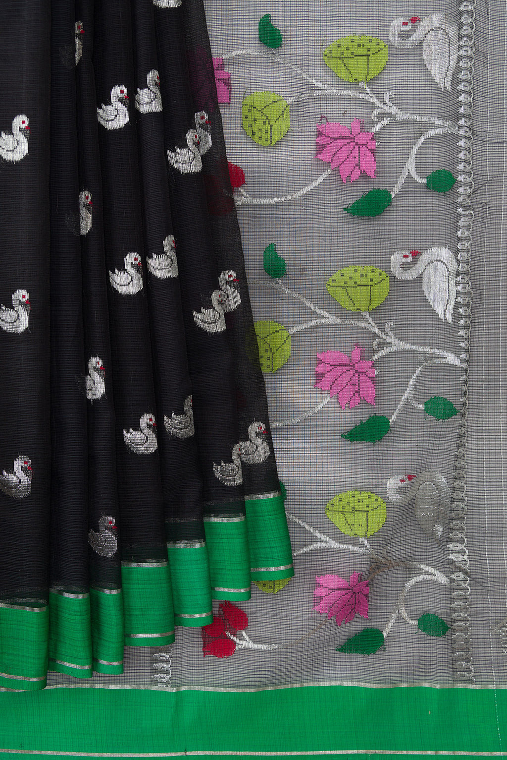 Pleats and pallu of Black Kota Silk Saree with Zari Butta on the body and Plain Border. 