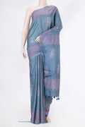 Blue Grey Tussar Silk Saree with Checked design on the body and Fancy Border.  displayed on a mannequin