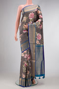 Grey Dual Tone Kanchipuram Silk Saree with Printed design on the body and Zari Border.  displayed on a mannequin