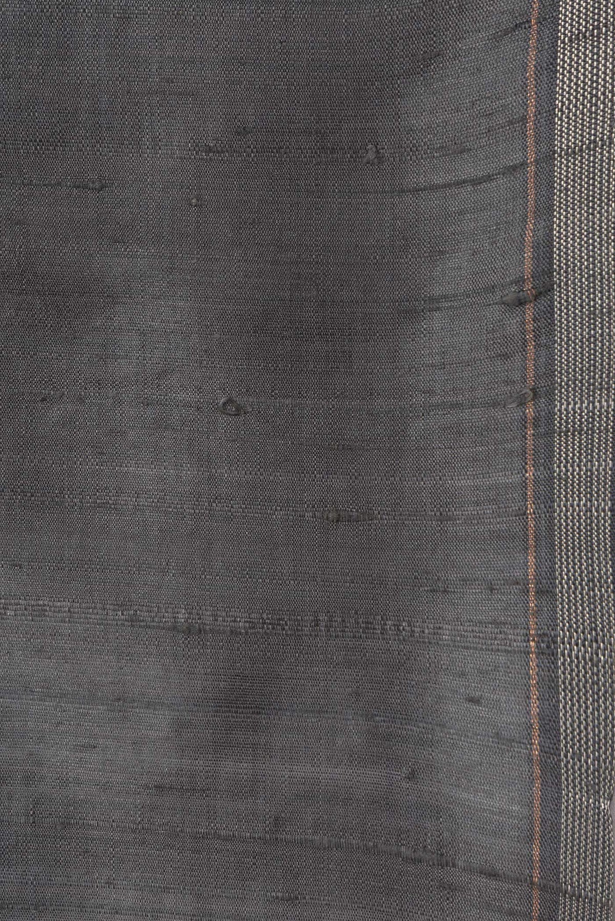 Border image of Grey Dual Tone Raw Silk Saree with Plain Body and Thin Zari Line. 