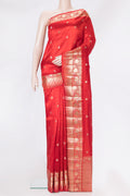 Red Tussar Silk Saree with Zari Butta on the body and Zari Border.  displayed on a mannequin