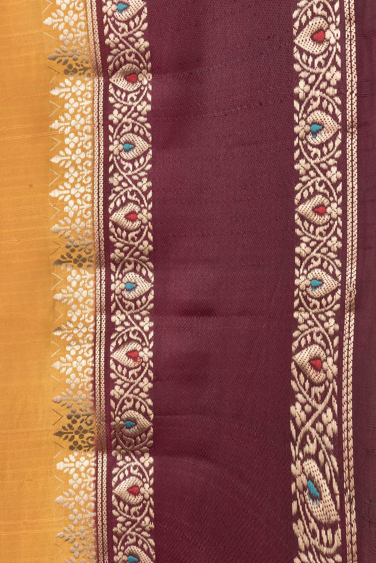 Border image of Mustard Dual Tone Tussar Silk Saree with Zari Butta on the body and Fancy Border. 