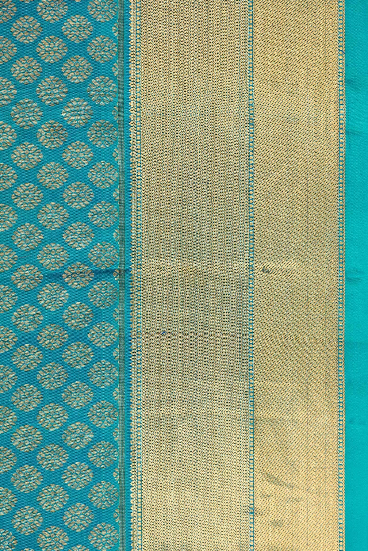 Border image of Peacock Blue Dual Tone Kanchipuram Silk Saree with Zari Brocade on the body and Zari Border. 