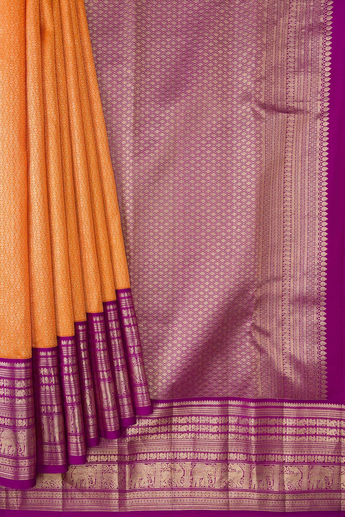 Pleats and pallu of Orange Kanchipuram Silk Saree with Zari Brocade on the body and Zari Border. 