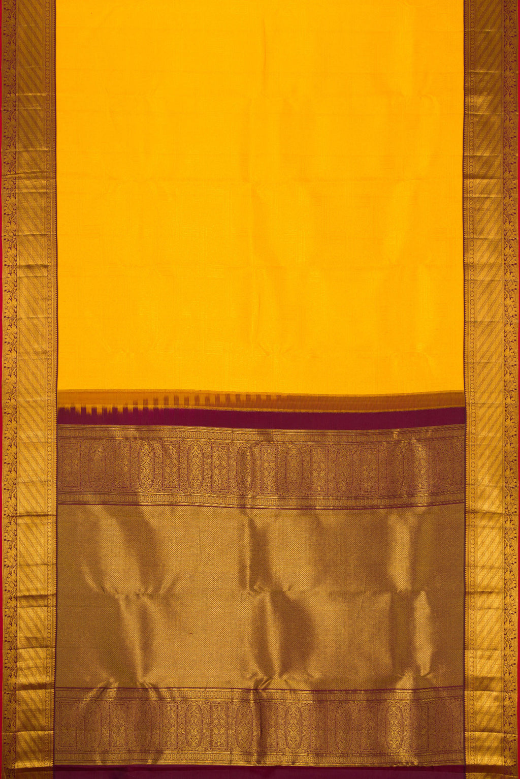 Flat view of Yellow Kanjivaram Silk Saree with Zari Brocade on the body and Zari Border. 