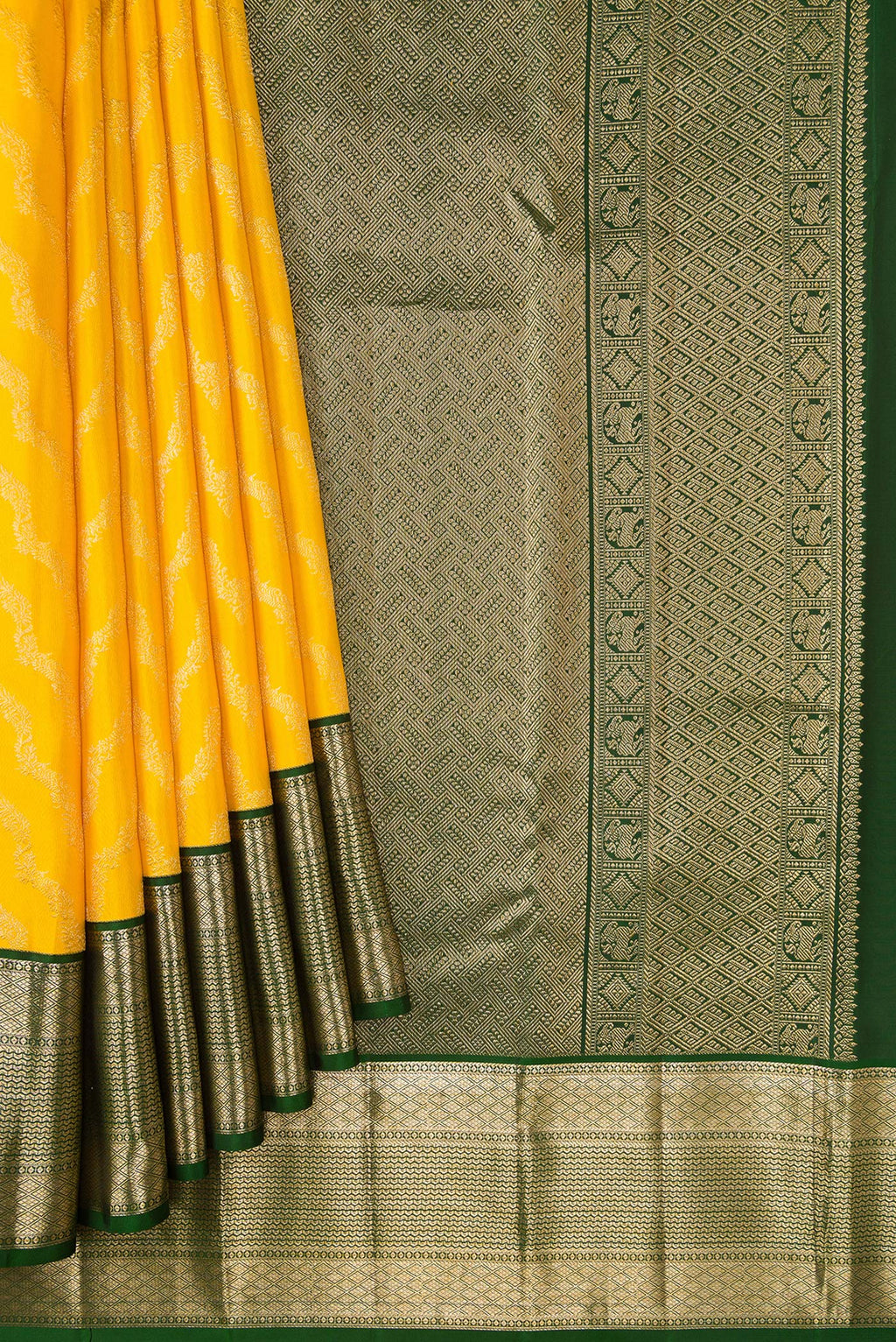 Pleats and pallu of Yellow Kanjivaram Silk Saree with Zari Brocade on the body and Zari Border. 