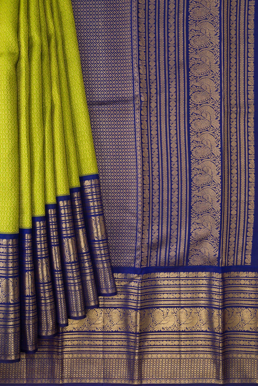 Pleats and pallu of Green Kanjivaram Silk Saree with Zari Brocade on the body and Zari Border. 