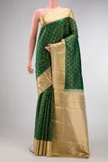Bottle Green Kanjivaram Silk Saree with Zari Brocade on the body and Zari Border.  displayed on a mannequin