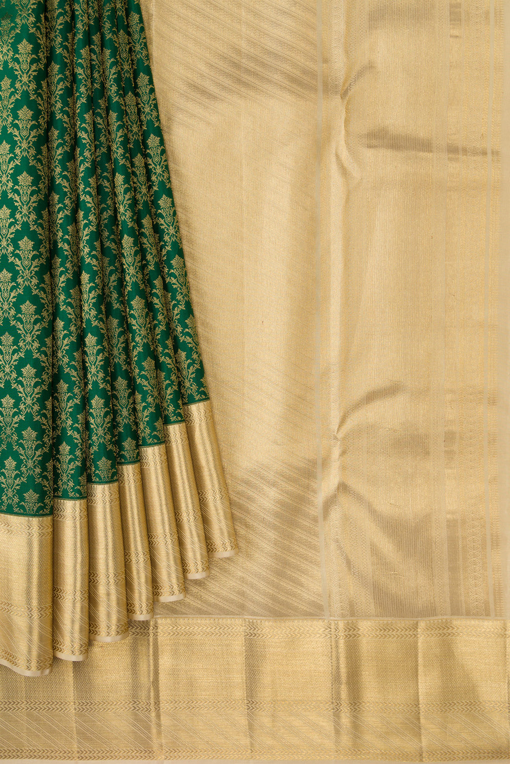 Pleats and pallu of Bottle Green Kanjivaram Silk Saree with Zari Brocade on the body and Zari Border. 
