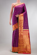 Purple Dual Tone Kanjivaram Silk Saree with Checked design on the body and Zari Border.  displayed on a mannequin