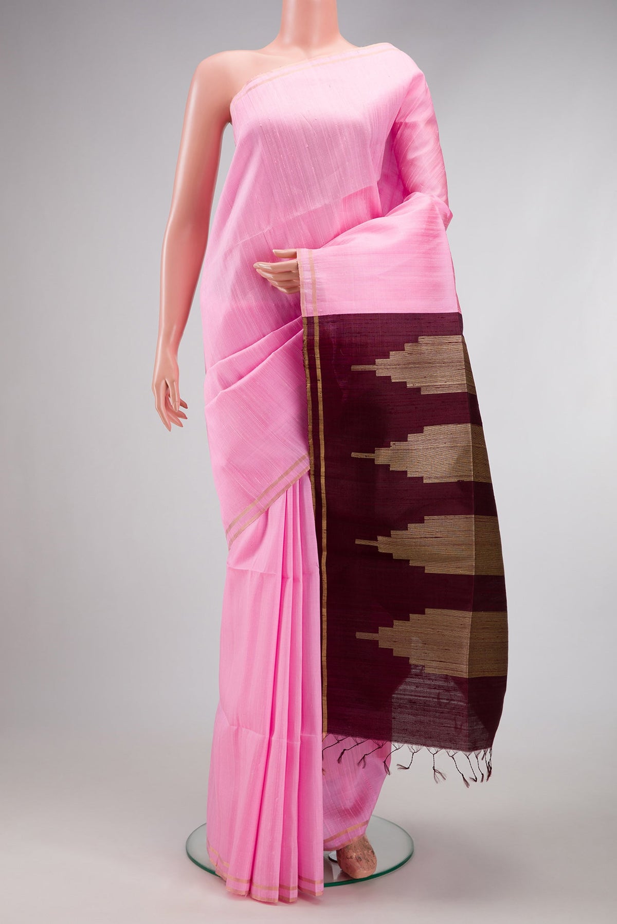 Pink Raw Silk Saree with Plain Body and Zari Border.  displayed on a mannequin