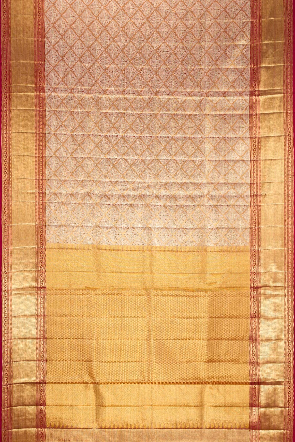 Flat view of Gold Dual Tone Kanjivaram Tissue Silk Saree with Zari Brocade on the body and Zari Border. 