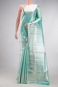 Pure Silk Pure Zari Sky Blue Dual Tone Kanjivaram Tissue Saree with Zari Brocade on the body and Zari Border.  displayed on a mannequin