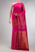 Dark Pink Dual Tone Kanjivaram Silk Saree with Zari Butta on the body and Without Border.  displayed on a mannequin